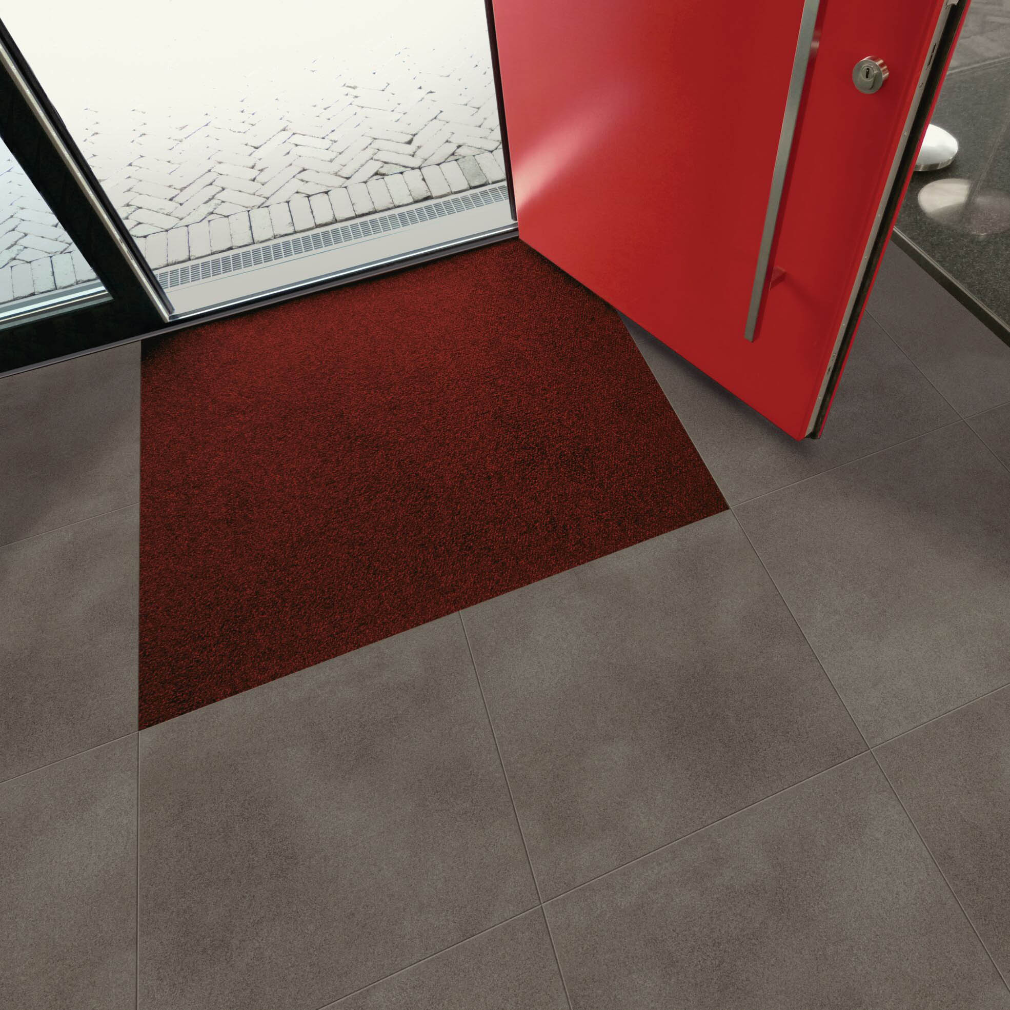 Sol vinyle plombant objectflor simplay dark grey concrete 2569 pierre dans une entrée